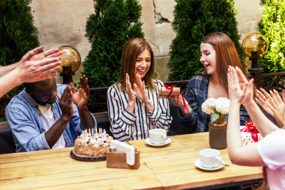 Guests celebrating a birthday in our private dining space